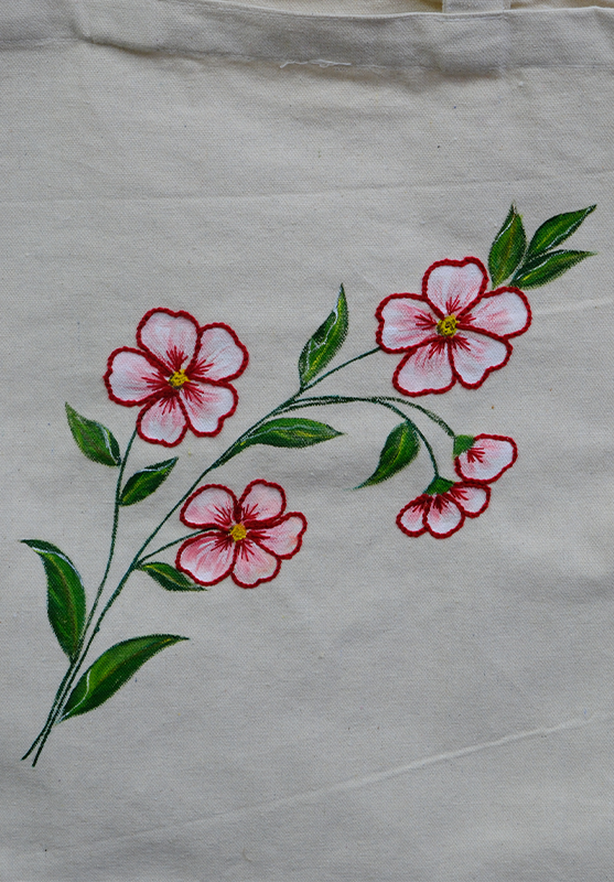 Handcrafted canvas tote featuring original artistic design