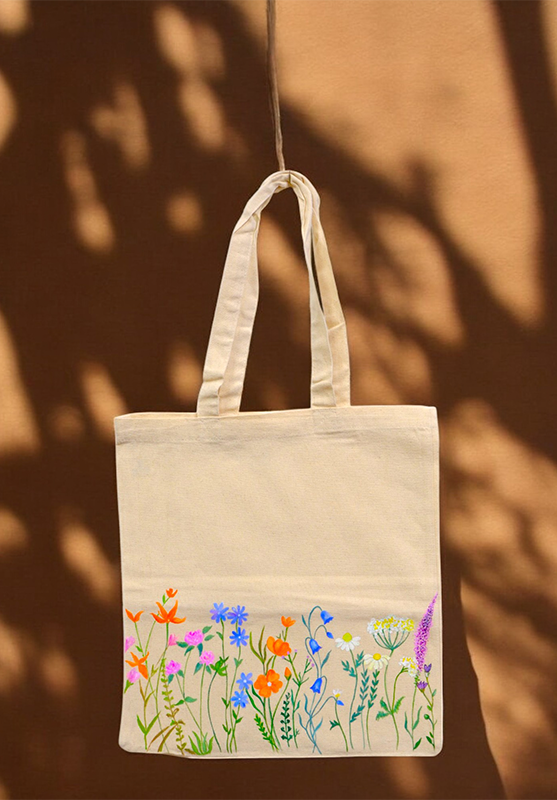 Hand-painted cotton tote bag with unique artistic design