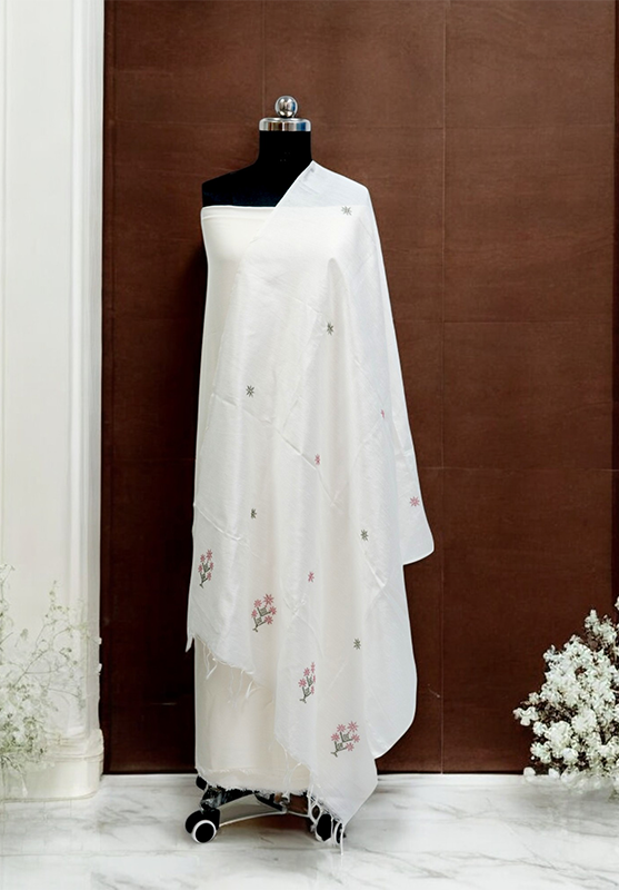 Close-up of intricate Kasuti embroidery on vibrant dupatta