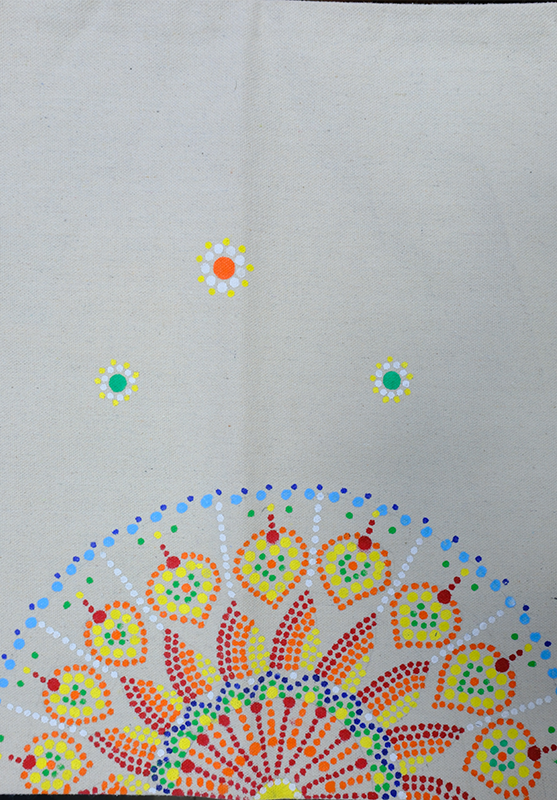Colorful mandala design on hand-painted tote bag