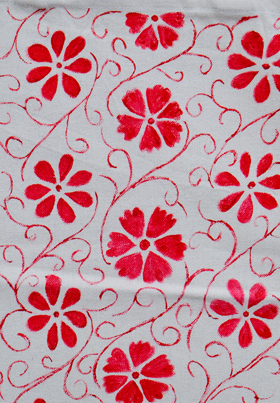 Sustainable tote bag featuring vibrant hand-painted design by artisans