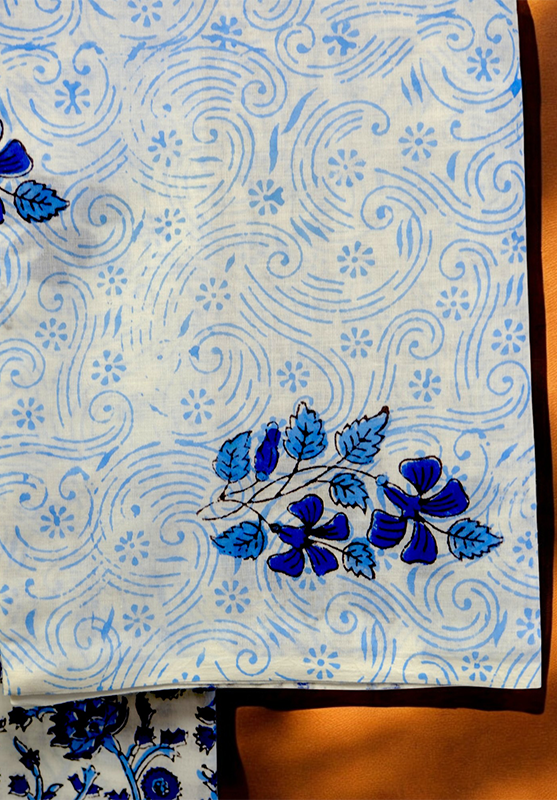 Hand block printed unstitched cotton suit with ethnic patterns