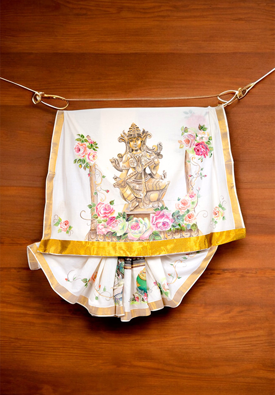 Traditional saree featuring bespoke hand-painted design