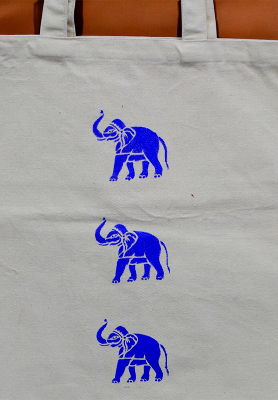 Hand-painted Sanjhi art tote bag with traditional design