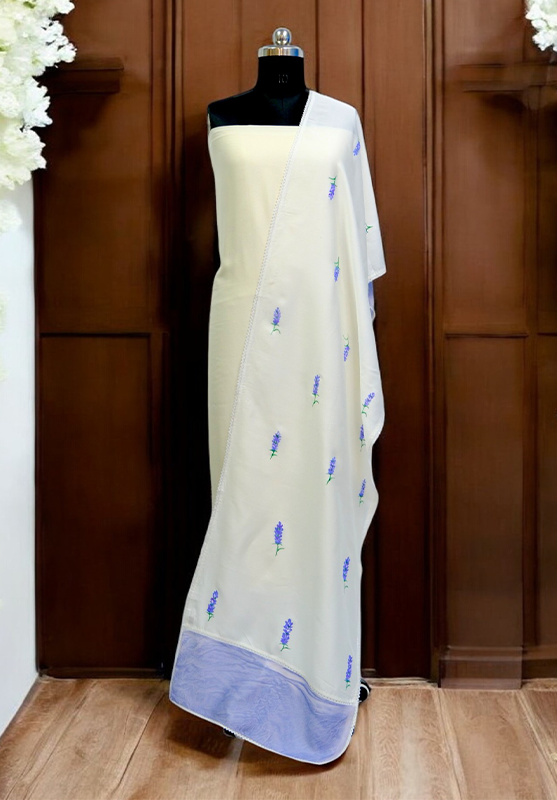 A silk stole with vibrant floral hand-painted patterns on a soft pastel background.