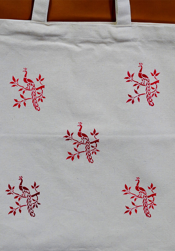 Eco-friendly tote bag featuring Sanjhi painting on cotton fabric

