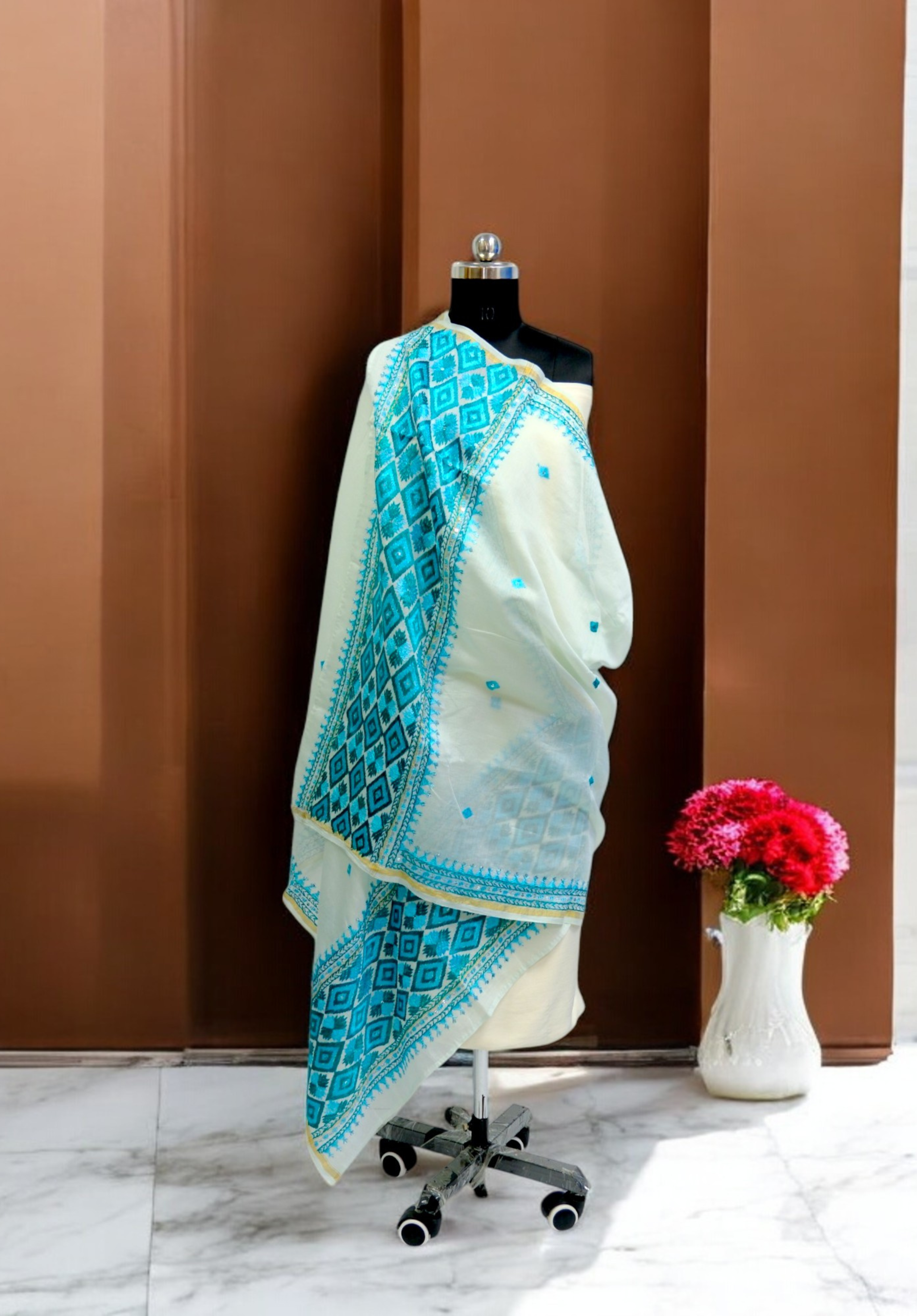 Embroidered Phulkari dupatta with vibrant floral motifs
