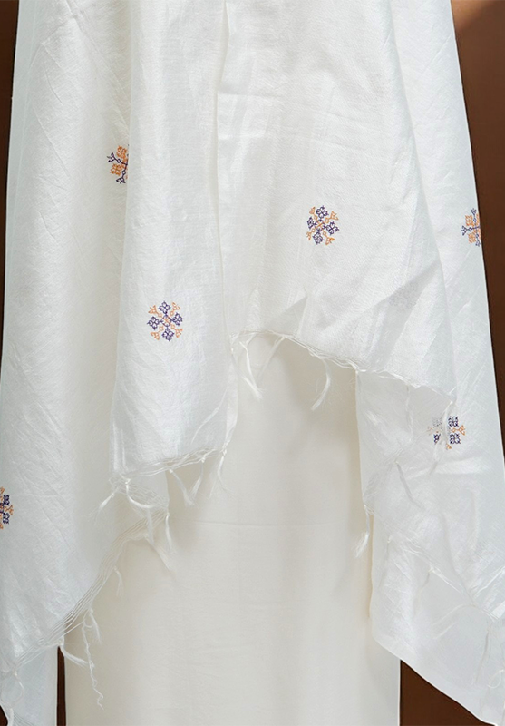 Folded view of white hand embroidered Kasuti dupatta